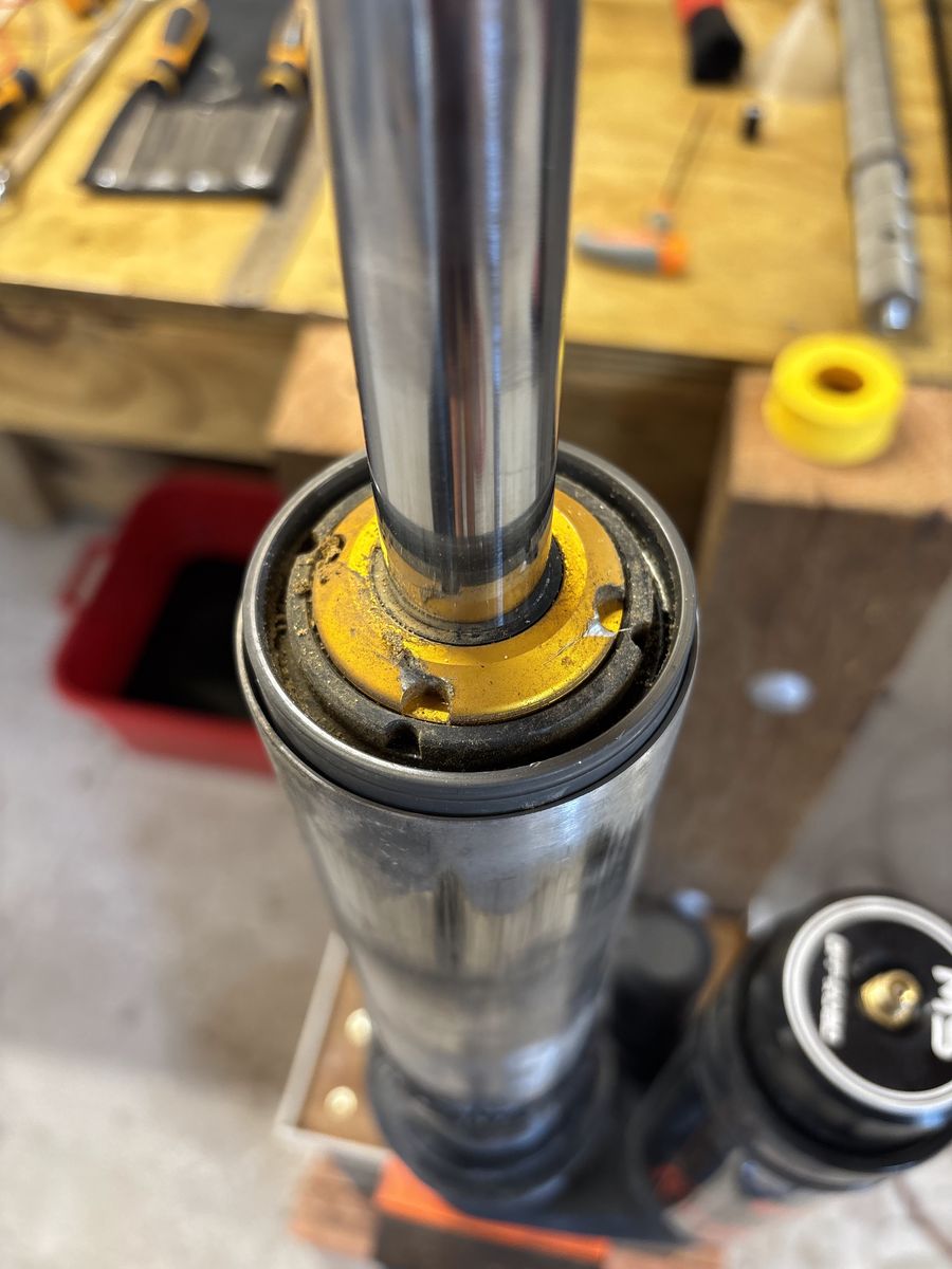 Worn and dirty shock seal head ready for a rebuild