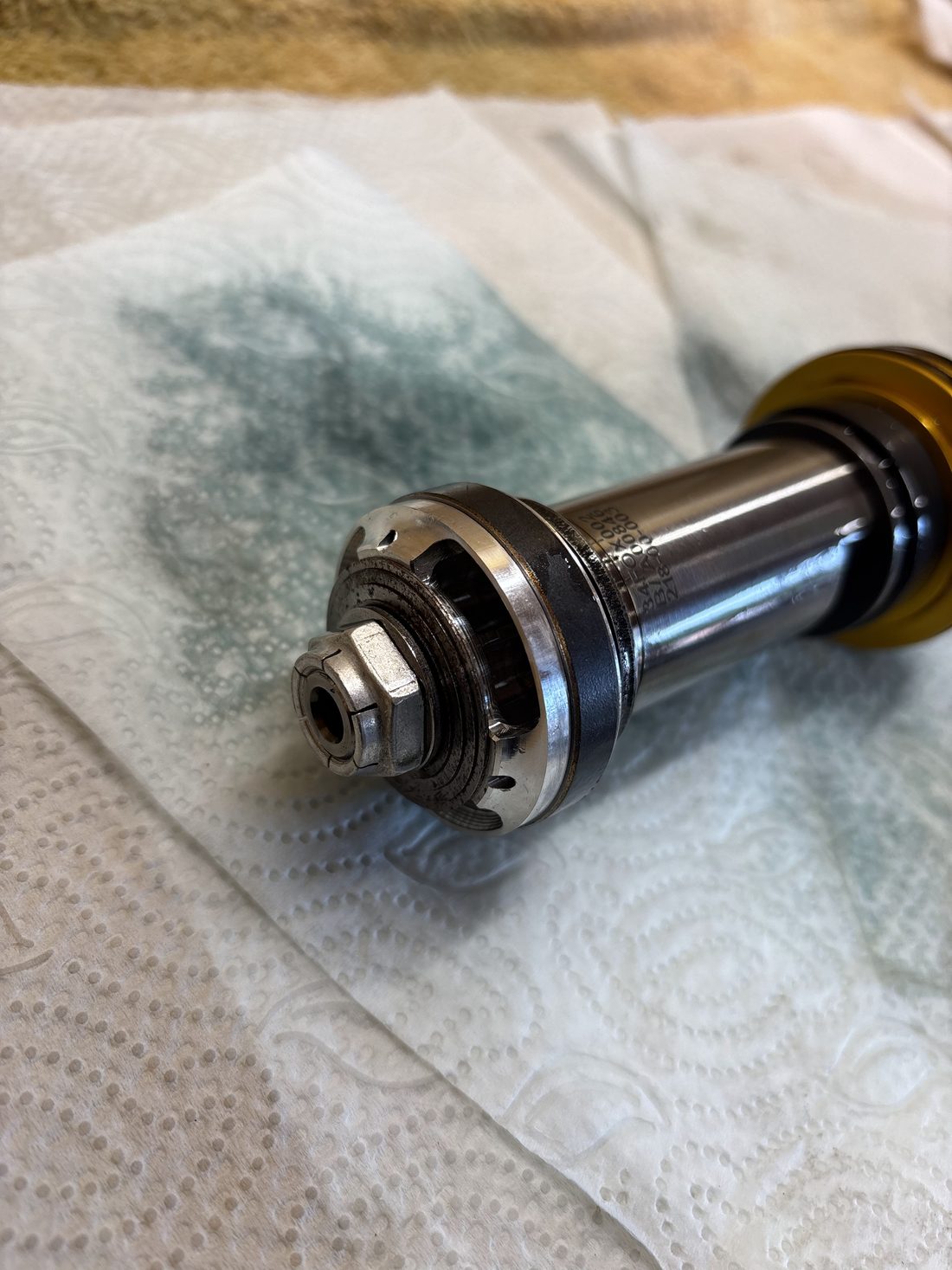 Shock piston and shaft stripped down during a rebuild